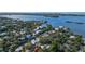 Aerial view of waterfront property showcasing a single Gathering home at 1411 Quail Dr, Sarasota, FL 34231