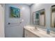 Bathroom with updated vanity and shower at 1411 Quail Dr, Sarasota, FL 34231