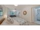 Comfortable bedroom with ensuite bathroom access at 1411 Quail Dr, Sarasota, FL 34231