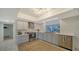 Modern kitchen with light blue cabinets and stainless steel appliances at 1411 Quail Dr, Sarasota, FL 34231