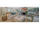 Living room features a comfy sofa and sliding doors to the pool at 1411 Quail Dr, Sarasota, FL 34231
