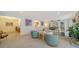 Spacious living area featuring ample seating and kitchen views at 1411 Quail Dr, Sarasota, FL 34231