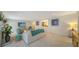 Bright living room with comfy seating and a view into the kitchen at 1411 Quail Dr, Sarasota, FL 34231