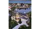 Stunning waterfront home with private dock and lush landscaping at 1560 Harbor Sound Dr, Longboat Key, FL 34228