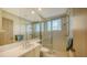 Bathroom with shower, toilet and single vanity at 1560 Harbor Sound Dr, Longboat Key, FL 34228