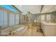 Elegant bathroom with a large bathtub and walk-in shower at 1560 Harbor Sound Dr, Longboat Key, FL 34228