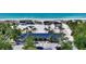 Beach club with covered seating and ocean views at 1560 Harbor Sound Dr, Longboat Key, FL 34228