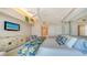 Spacious bedroom with a king-size bed and en-suite bathroom at 1560 Harbor Sound Dr, Longboat Key, FL 34228