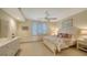 Bright bedroom with king-size bed and ample closet space at 1560 Harbor Sound Dr, Longboat Key, FL 34228
