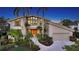 Luxury home with mature landscaping and a large driveway at 1560 Harbor Sound Dr, Longboat Key, FL 34228