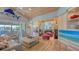 Spacious living room with built-in entertainment center at 1560 Harbor Sound Dr, Longboat Key, FL 34228