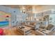 Bright living room with a view to kitchen and open floor plan at 1560 Harbor Sound Dr, Longboat Key, FL 34228
