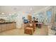 Spacious home office with built-in shelving and window at 1560 Harbor Sound Dr, Longboat Key, FL 34228