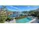 Inviting pool and spa with waterfront views at 1560 Harbor Sound Dr, Longboat Key, FL 34228