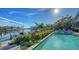 Expansive pool, private dock and serene waterfront views at 1560 Harbor Sound Dr, Longboat Key, FL 34228