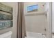 Clean bathroom featuring a shower/tub combo and updated fixtures at 16003 Kendleshire Ter, Lakewood Ranch, FL 34202