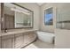Elegant bathroom with double vanity and soaking tub at 16003 Kendleshire Ter, Lakewood Ranch, FL 34202