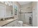 Modern bathroom with a walk-in shower and updated vanity at 16003 Kendleshire Ter, Lakewood Ranch, FL 34202
