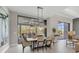 Bright dining room with sliding glass doors to the patio at 16003 Kendleshire Ter, Lakewood Ranch, FL 34202