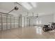 Large garage with epoxy floor and extra storage at 16003 Kendleshire Ter, Lakewood Ranch, FL 34202