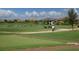 Golf course with putting green and driving range, near residential buildings at 16003 Kendleshire Ter, Lakewood Ranch, FL 34202