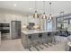 Gourmet kitchen boasts modern appliances and large island at 16003 Kendleshire Ter, Lakewood Ranch, FL 34202
