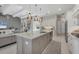 Open kitchen with large island and stainless steel appliances at 16003 Kendleshire Ter, Lakewood Ranch, FL 34202