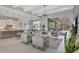Open concept living room, kitchen, and dining area at 16003 Kendleshire Ter, Lakewood Ranch, FL 34202