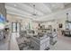 Open floor plan with modern furnishings and kitchen at 16003 Kendleshire Ter, Lakewood Ranch, FL 34202