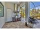 Modern outdoor kitchen with built-in grill at 16003 Kendleshire Ter, Lakewood Ranch, FL 34202