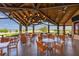 Outdoor patio furniture with golf course view at 16003 Kendleshire Ter, Lakewood Ranch, FL 34202