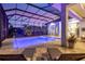 Night view of a relaxing pool and spa area at 16003 Kendleshire Ter, Lakewood Ranch, FL 34202