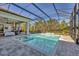 Relaxing pool and spa with covered lanai at 16003 Kendleshire Ter, Lakewood Ranch, FL 34202