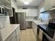 Well-equipped kitchen with stainless steel appliances at 1832 Sunny Dr # D32, Bradenton, FL 34207