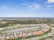 Aerial view of a lakefront community at 20296 Bandera Pl, Venice, FL 34293