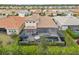 House with pool and screened enclosure, aerial view at 20296 Bandera Pl, Venice, FL 34293