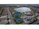 Community pool, tennis courts, playground, and lake at 20296 Bandera Pl, Venice, FL 34293