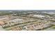 Aerial view of large community with houses and waterways at 20296 Bandera Pl, Venice, FL 34293