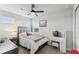 Cozy bedroom with a queen-size bed and vanity at 20296 Bandera Pl, Venice, FL 34293