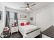Bright bedroom with a queen bed and plenty of closet space at 20296 Bandera Pl, Venice, FL 34293