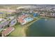 Aerial view of community pool and tennis courts at 20296 Bandera Pl, Venice, FL 34293