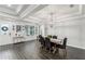 Elegant dining room featuring a wood table and chandelier at 20296 Bandera Pl, Venice, FL 34293