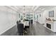 Open dining room with hardwood floors and fireplace view at 20296 Bandera Pl, Venice, FL 34293