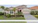 Beautiful home exterior with landscaping and driveway at 20296 Bandera Pl, Venice, FL 34293