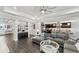 Open concept living room, kitchen, and dining area at 20296 Bandera Pl, Venice, FL 34293