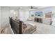 Spacious loft area with comfortable seating and a large TV at 20296 Bandera Pl, Venice, FL 34293