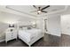 Main bedroom with white bed frame and ensuite bathroom access at 20296 Bandera Pl, Venice, FL 34293