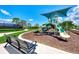 playground with shaded area and benches at 20296 Bandera Pl, Venice, FL 34293