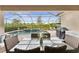 Relaxing pool area with covered patio and outdoor kitchen at 20296 Bandera Pl, Venice, FL 34293