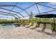 Enclosed pool and spa with ample lounge space at 20296 Bandera Pl, Venice, FL 34293